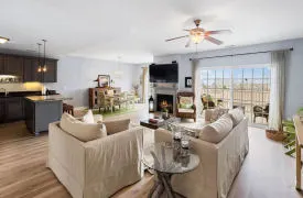Main living area with balcony and views of New Buffalo waterfront