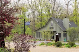 Exterior view of secluded cottage in Walden Woods